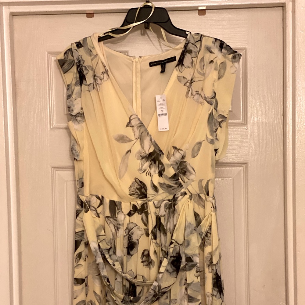 White House Black Market NWT.  Beautiful floral dress. Long . Gorgeous on.